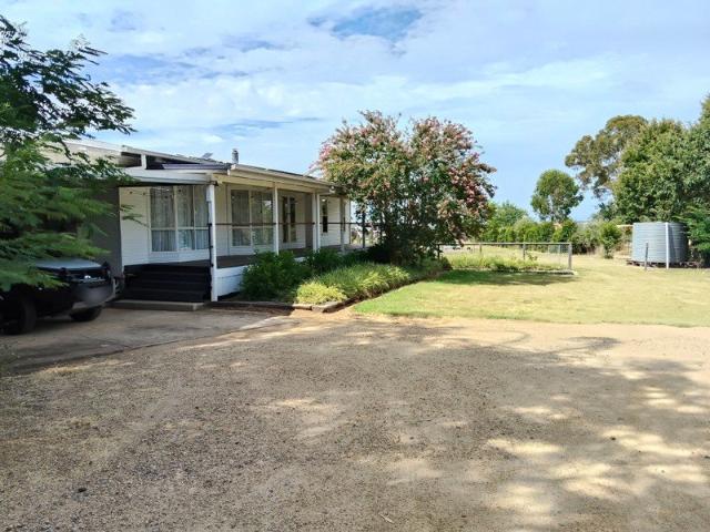 Kingaroy Home with 4 Beds, Solar, Deck, & Spacious 3855m² Land