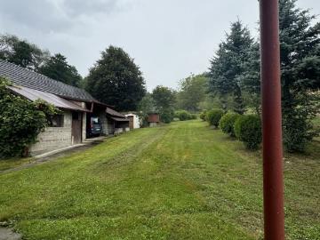 Dom wolnostojący 100 m2 na dużej działce 44 ar z garażem