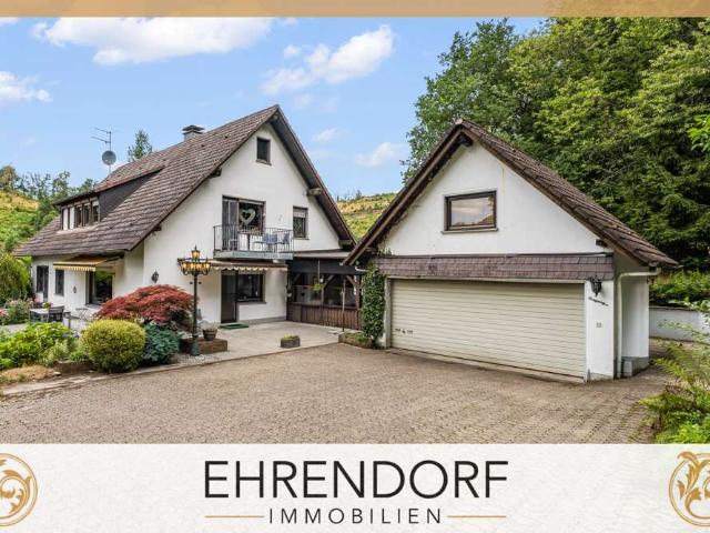 Preisreduzierung* Komfortable Erdgeschosswohnung mit Terrasse und Garten in Zweifamilienhaus
