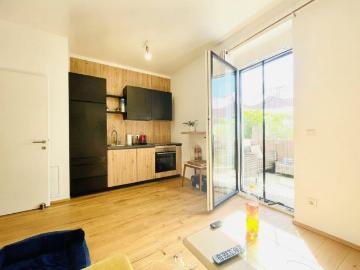 Kompakte und moderne 2 Zimmer Gartenwohnung mit Terrasse & Garage!
