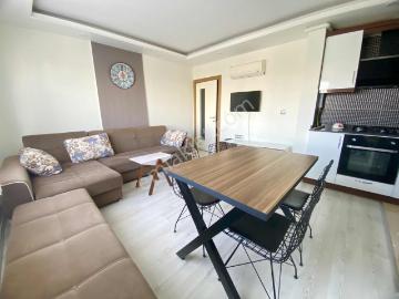 Konyaaltı Hurma'da Havuzlu Binada Eşyalı Kiralık 1+1 Daire