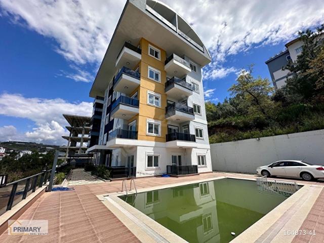 KONAKLI MAHALLESİ'NDE DENİZ MANZARALI SATILIK 1+1 DAİRE