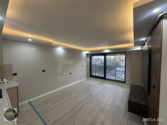 KOCATEPE CAMİİ KARŞISINDA YENİ BİNA ARA KAT 1+1