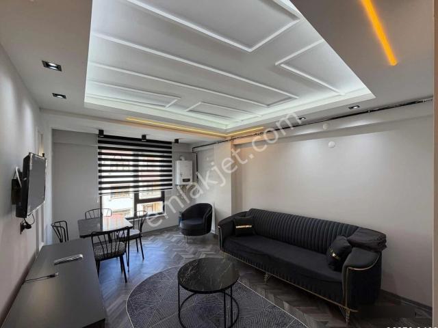 Kolçan Emlak'tan Cafeler Caddesi Rezidansta Kiralık 1+1 Daire