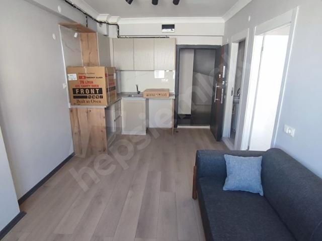 KOLÇAN EMLAK'TAN ARA KAT FETTAH SÖGÜTLER'DE 1+1 DAİRE SATILIK