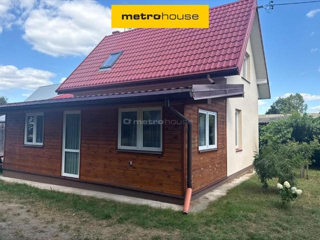 Urokliwe siedlisko 100 m2 z stawem i garażami
