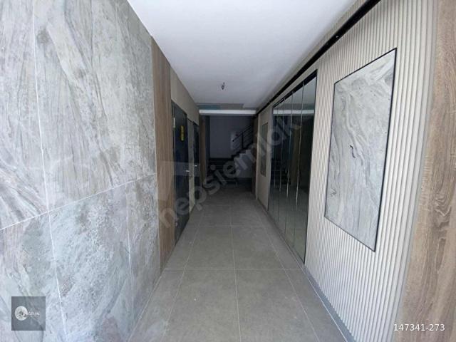 KÖRFEZDE DENİZ MANZARALI SIFIR KİRALIK 1+1 DAİRE EŞYASIZ