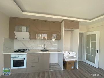 KÖYCEĞİZ GELİŞİM MAHALLESİNDE MERKEZİ KONUMDA EV VE OFİS KULLANIMINA UYGUN KİRALIK 1+1 DAİRE