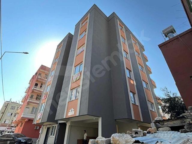 KOZAN DİVAN EMLAK'TAN GÖÇ YOLUNA KOMŞU SIFIR SATILIK 3+1