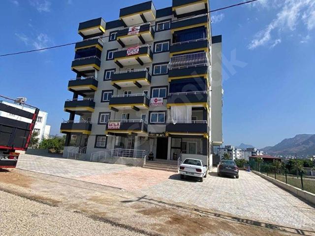 KOZAN DİVAN EMLAK'TAN OKULA KOMŞU SIFIR DAİRE