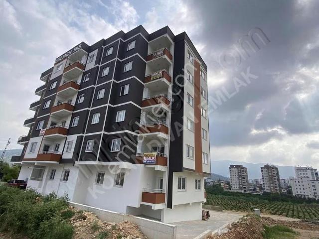 Kozan Divan Emlak'tan Üniversite Kavşağında Şık Daire
