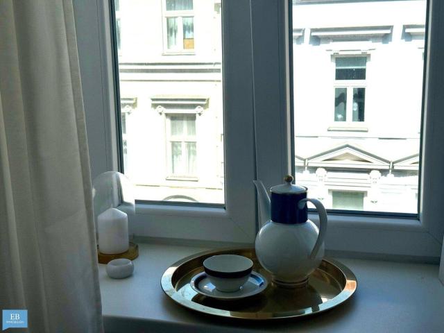 Klein, fein, mein: Elegantes City Apartement mit Altbauflair