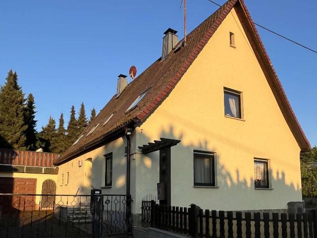Kleinod auf besonderem Grundstück Potenzial für Neubau