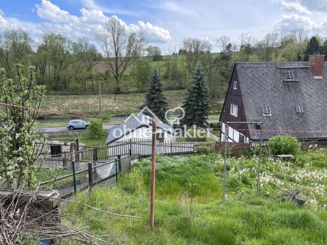 Kleines Haus mit Garten und Blick auf die Mulde