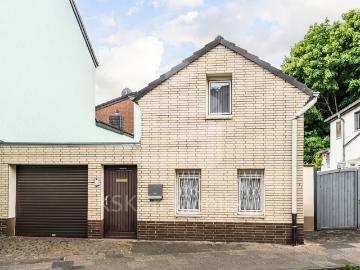 Kleines Haus mit Garten und Garage sucht frischen Wind und neue BewohnerInnen!