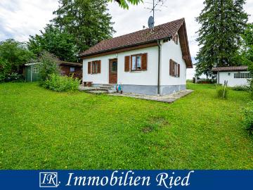 Kleines Häuschen mit ganz großem Grund in grüner Umgebung im schönen Inning am Ammersee