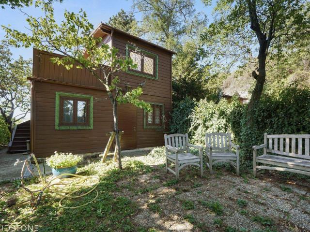 Kleingartenhaus in den Weinbergen Döblings mit traumhaftem Wienblick und eigenem Garten