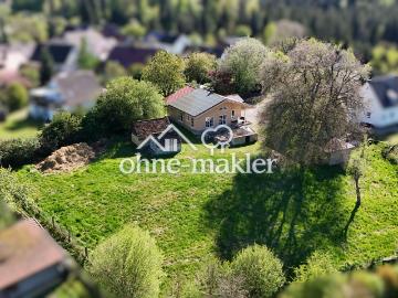 Klimafreundlicher Massivholz Bungalow mit traumhaftem Grundstück in Naturlage