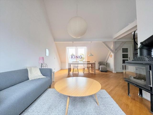 Klimatyczne mieszkanie 52 m² z antresolą i kominkiem