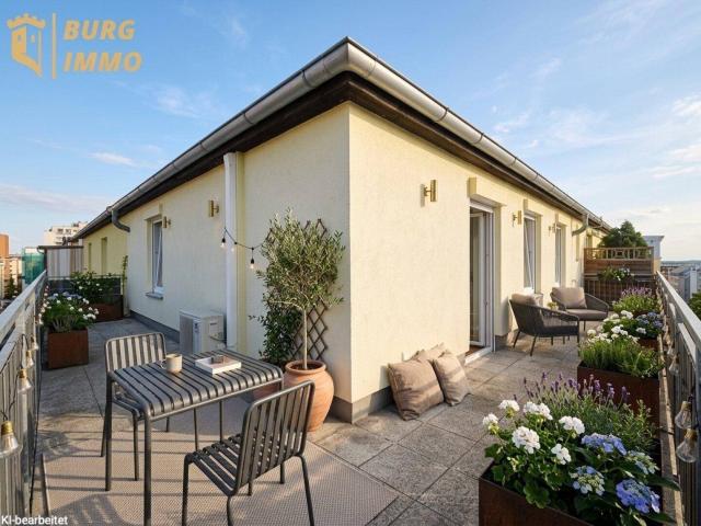 Klimatisierte 2 Zimmer Dachgeschosswohnung mit großzügiger 33 m² Eckterrasse