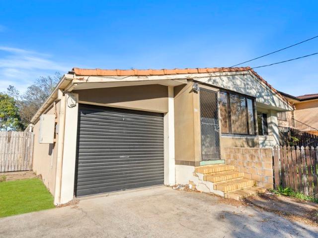Knock Knock Opportunity awaits Great First Home or Smart Investment in a Convenient Location