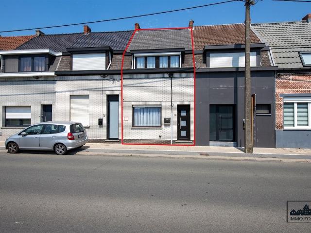 Knusse rijwoning op centrale ligging