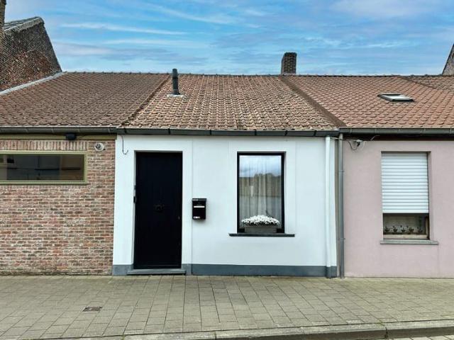 Knusse rijwoning op toplocatie