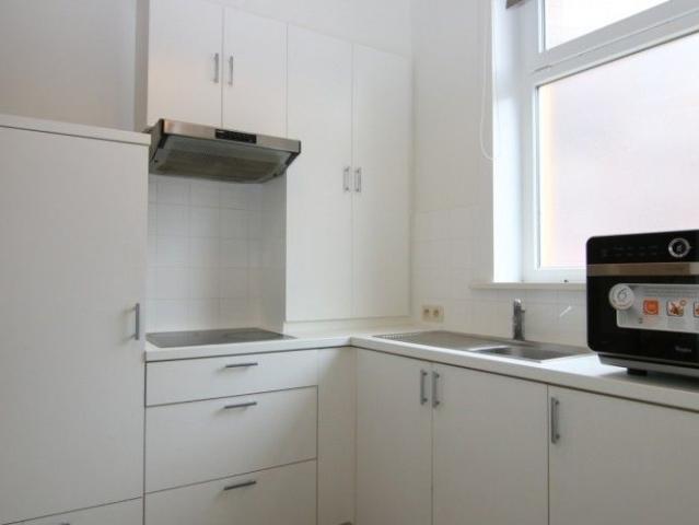 Knusse rijwoning, centrum Kortrijk