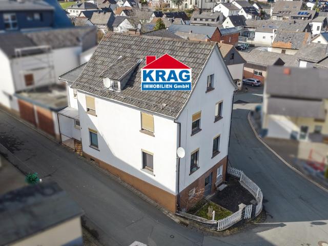 KRAG Immobilien + Kompaktes Wohnhaus mit zwei Küchen und Entwicklungschance für Anleger