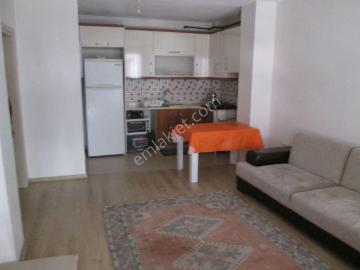 Krc'den Merkezi Konumda Eşyalı Giriş Kat 2+1 Amerikan Mutfak Daire