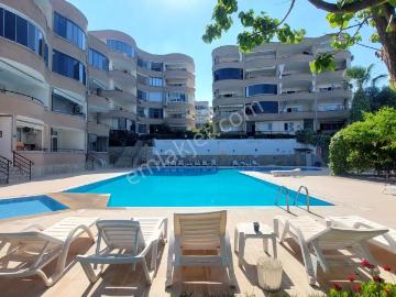 Kuşadası Marina Bölgesinde, Havuz Ve Yeşil Alan Manzaralı Satılık Daire
