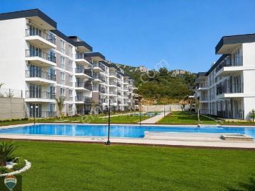 Kuşadasında Doğa Içerısınde Havuzlu 1+1 Satılık Daıre