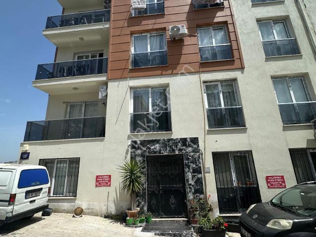 Kuşadası Alacamescit Mahallesinde Satılık 2+1 Yeni Daire