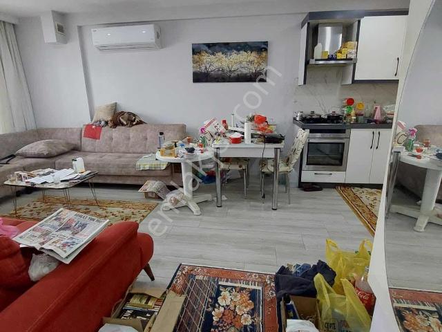 Kuşadası Davutlar Merkezde Full Eşyalı 1+1 Bahçe Katı Daire