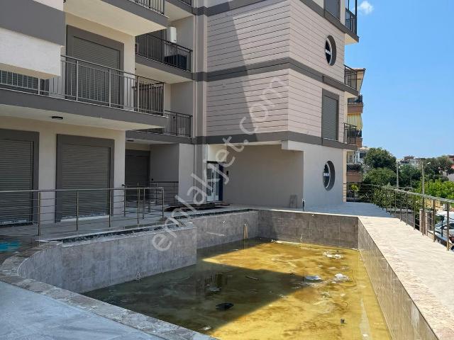 Kuşadası Davutlar Merkezde 1+1 Havuzlu Sıfır Lüks Daire
