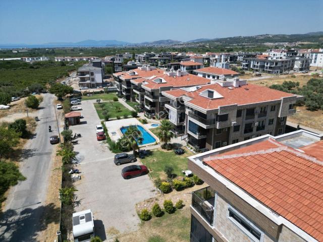 Kuşadası Davutlar’da Satılık Deniz Manzaralı 2+1 Ara Kat Daire