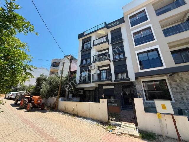 Kuşadası Davutlar’da 1+1 Full Eşyalı, Bahçeli, Sıfır Ayarında Satılık Daire