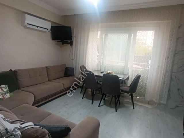 Kuşadası Davutlar'da Bahçe Katı Kiralık 1+1 Eşyalı Daire