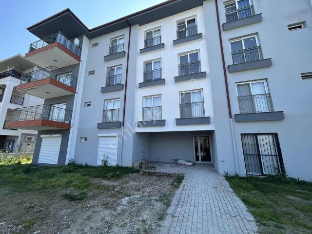 Kuşadası Davutlar'da Deniz Manzaralı Satılık 1+1 Daire