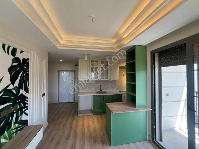 Kuşadası Davutlar'da Full Deniz Manzaralı 1+1 Lüks Daire Satılık