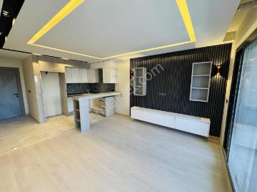 Kuşadası Davutlar'da Kendine Ait Bahçeli Satılık 2+1 Sıfır Daire