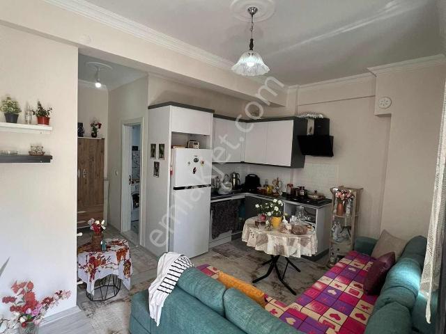 Kuşadası Davutlarda Merkezi Konumda Satılık Sıfır 1+1 Daire