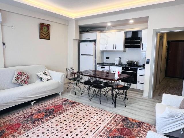 Kuşadası Davutlar'da Satılık 2+1: Merkezi Konum