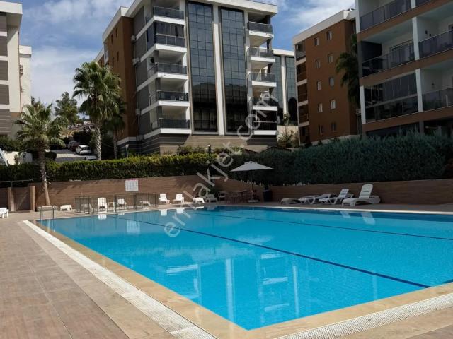 Kuşadası Değirmendere’de Havuzlu Ve Güvenlikli Sitede Satılık 2+1 Daire