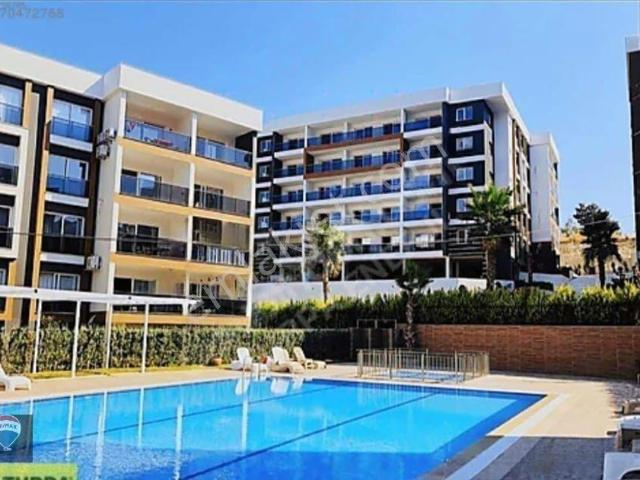 Kuşadası Değirmendere’de Sinerji Sitesinde 3+1 Eşyalı Kiralık Daire