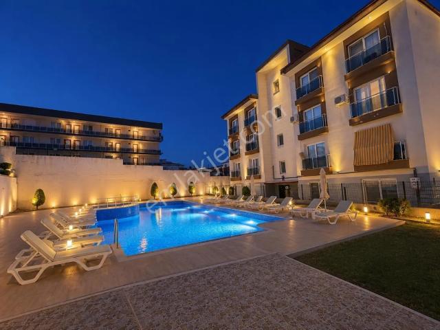 Kuşadası Değirmendere'de Özel Bahçeli Havuzlu Sitede 2+1