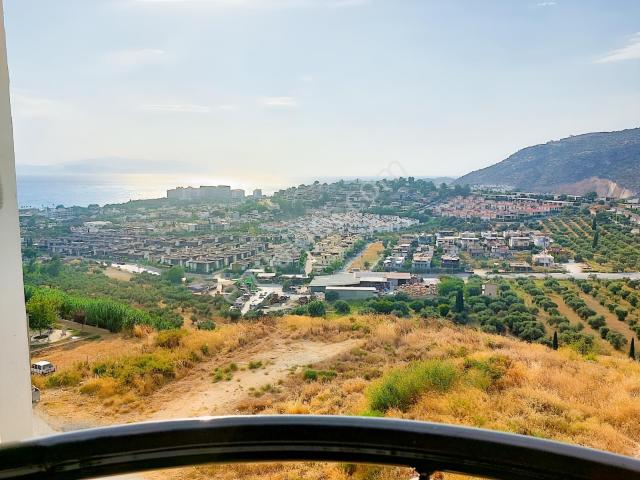 Kuşadası Değirmendere'de Deniz Manzaralı 2+1 Satılık Daire