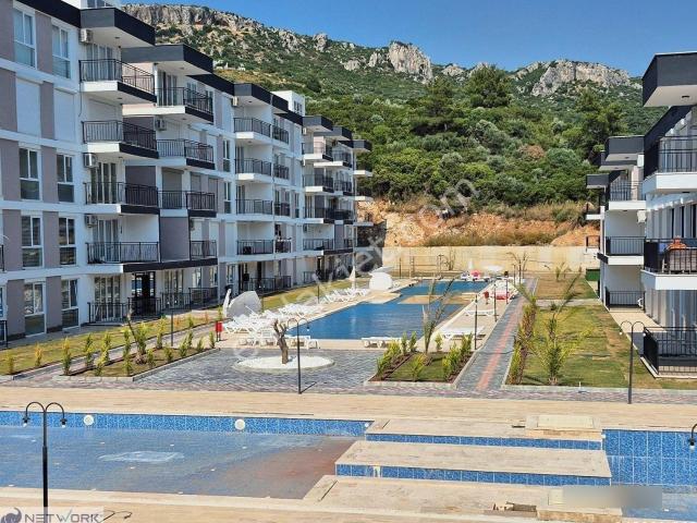 Kuşadası Eşin Vadi'de Satılık 2+1 Sıfır Daire eşyalı Seçenekli