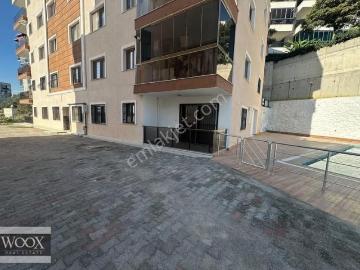 Kuşadası Ege Mahallesinde Satılık 2+1 Bahçe Katı Daire