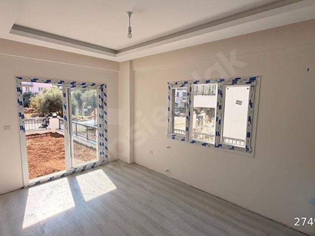 Kuşadası Güzelçamlıda Geniş Bahçeli Satılık 2+1 Daire